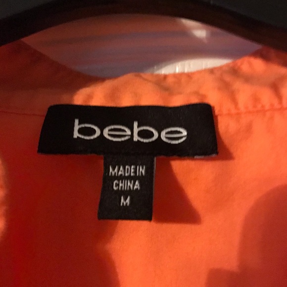 Bebe orange ruffle button up shirt in size M. - Picture 2 of 4